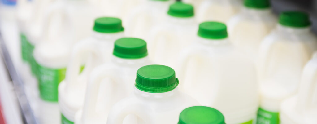 Milk bottles on shelf